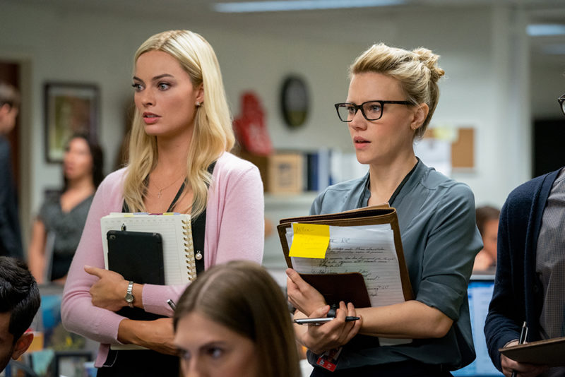 Margot Robbie as ‘Kayla Pospisil’ and Kate McKinnon as ‘Jess Carr’ in BOMBSHELL. Photo Credit: Hilary Bronwyn Gayle.