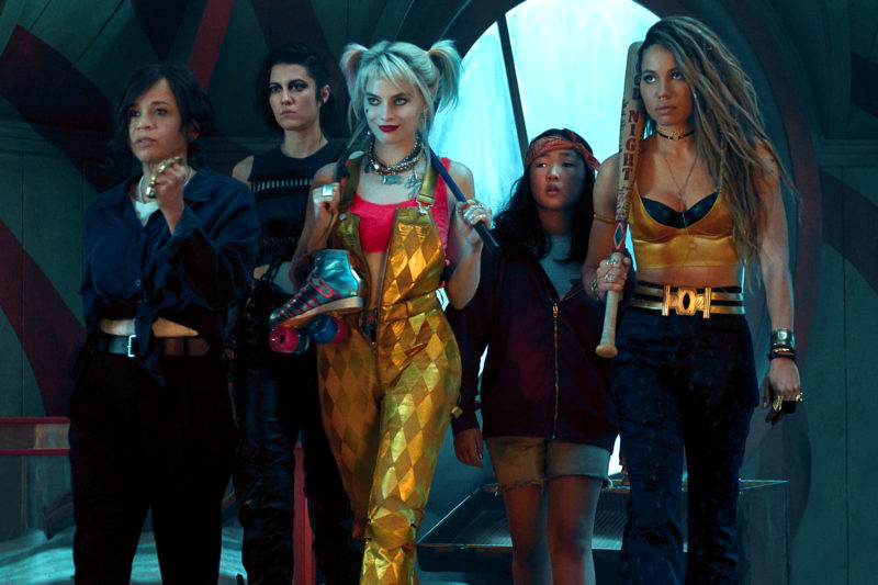 BIRDS OF PREY (AND THE FANTABULOUS EMANCIPATION OF ONE HARLEY QUINN) Copyright: © 2019 Warner Bros. Entertainment Inc. All Rights Reserved. TM & © DC Comics Photo Credit: Claudette Barius Caption: (L-r) ROSIE PEREZ as Renee Montoya, MARY ELIZABETH WINSTEAD as Huntress, MARGOT ROBBIE as Harley Quinn, ELLA JAY BASCO as Cassandra Cain and JURNEE SMOLLETT-BELL as Black Canary in Warner Bros. Pictures’ “BIRDS OF PREY (AND THE FANTABULOUS EMANCIPATION OF ONE HARLEY QUINN),” a Warner Bros. Pictures release.